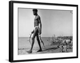 Australian Aborigine Man Bringing Back Two Monitor Lizards Known as Goannas to His Clan-Fritz Goro-Framed Photographic Print