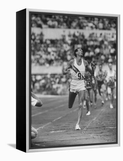 Australian Herb Elliot, Winning Men's 1500 Meter Race, at Olympics-George Silk-Framed Premier Image Canvas