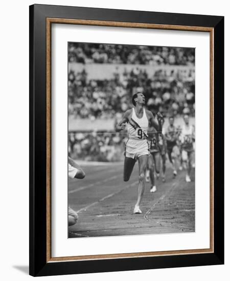 Australian Herb Elliot, Winning Men's 1500 Meter Race, at Olympics-George Silk-Framed Premium Photographic Print