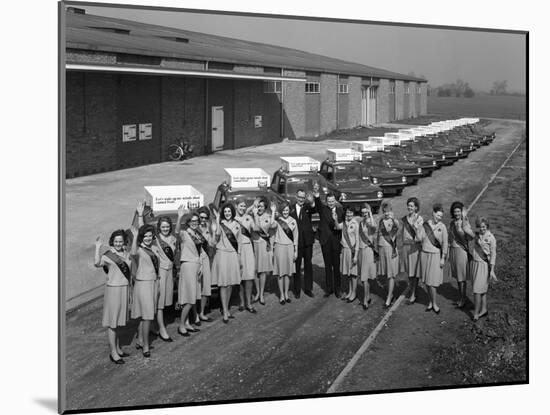 Australian Sales Girls in Front of a Fleet of 1965 Hillman Imps, Selby, North Yorkshire, 1965-Michael Walters-Mounted Photographic Print