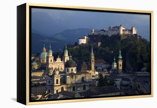 Austria, Salzburg. Overview of city beneath Hohensalzburg Fortress.-Jaynes Gallery-Framed Premier Image Canvas