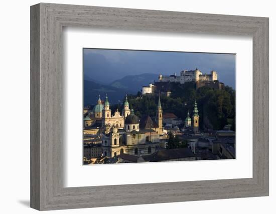 Austria, Salzburg. Overview of city beneath Hohensalzburg Fortress.-Jaynes Gallery-Framed Photographic Print