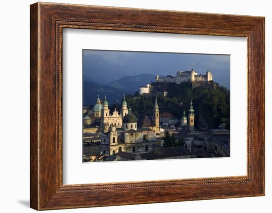 Austria, Salzburg. Overview of city beneath Hohensalzburg Fortress.-Jaynes Gallery-Framed Photographic Print