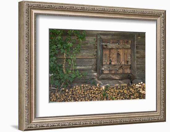 Austria, Tyrol, firewood in front of a wooden facade.-Roland T. Frank-Framed Photographic Print