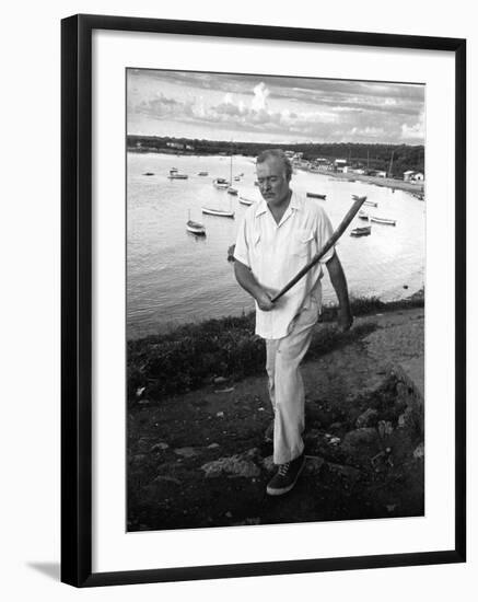 Author Ernest Hemingway Walking in Cojimar Harbor-Alfred Eisenstaedt-Framed Premium Photographic Print