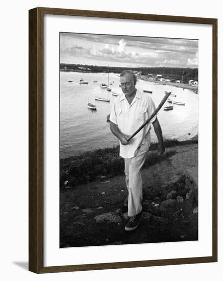 Author Ernest Hemingway Walking in Cojimar Harbor-Alfred Eisenstaedt-Framed Premium Photographic Print