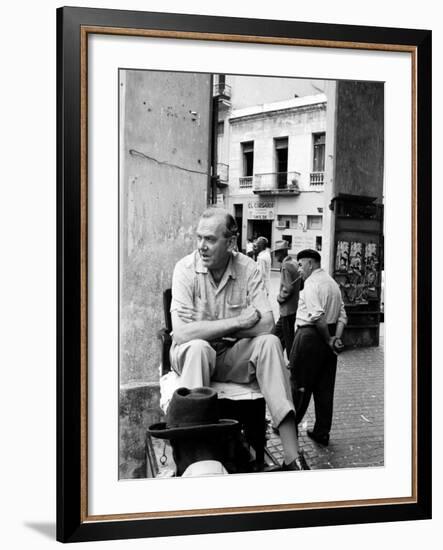 Author Graham Greene Sitting on the Set of "Our Man in Havana."-Peter Stackpole-Framed Premium Photographic Print