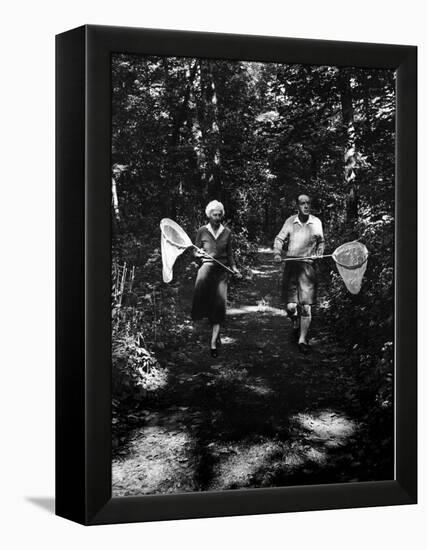 Author Vladimir Nabokov and His Wife Vera Chasing Butterflies-Carl Mydans-Framed Premier Image Canvas