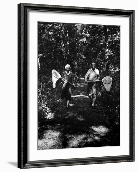 Author Vladimir Nabokov and His Wife Vera Chasing Butterflies-Carl Mydans-Framed Premium Photographic Print