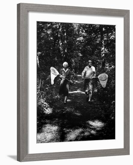 Author Vladimir Nabokov and His Wife Vera Chasing Butterflies-Carl Mydans-Framed Premium Photographic Print