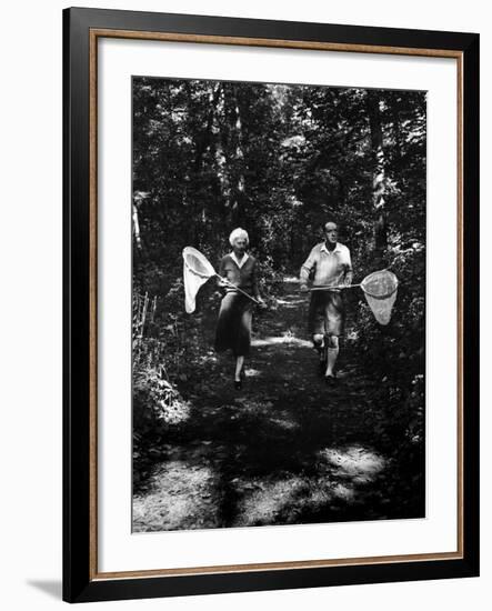 Author Vladimir Nabokov and His Wife Vera Chasing Butterflies-Carl Mydans-Framed Premium Photographic Print