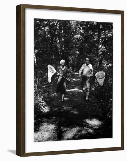 Author Vladimir Nabokov and His Wife Vera Chasing Butterflies-Carl Mydans-Framed Premium Photographic Print