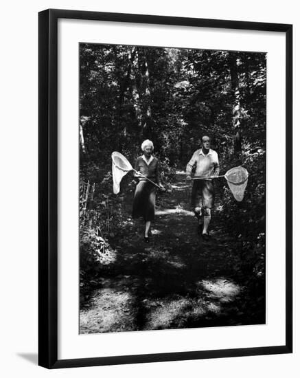 Author Vladimir Nabokov and His Wife Vera Chasing Butterflies-Carl Mydans-Framed Premium Photographic Print