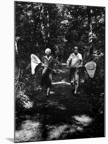 Author Vladimir Nabokov and His Wife Vera Chasing Butterflies-Carl Mydans-Mounted Premium Photographic Print