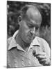 Author Vladimir Nabokov Looking at a Butterfly-Carl Mydans-Mounted Premium Photographic Print