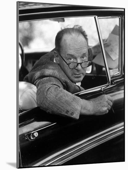 Author Vladimir Nabokov Looking Out Car Window. He Likes to Work in the Car, Writing on Index Cards-Carl Mydans-Mounted Premium Photographic Print