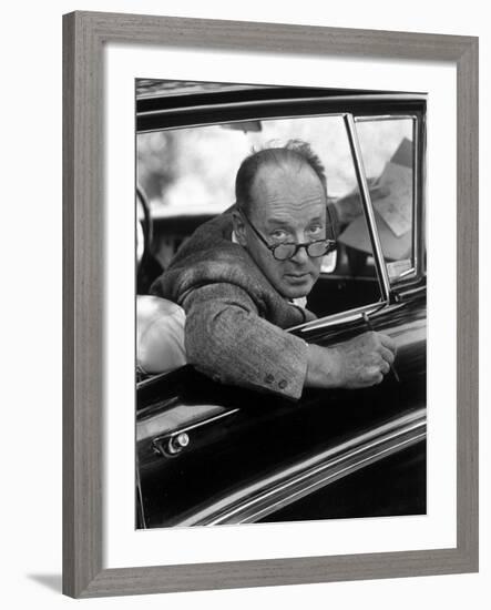 Author Vladimir Nabokov Looking Out Car Window. He Likes to Work in the Car, Writing on Index Cards-Carl Mydans-Framed Premium Photographic Print