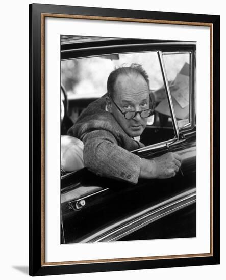 Author Vladimir Nabokov Looking Out Car Window. He Likes to Work in the Car, Writing on Index Cards-Carl Mydans-Framed Premium Photographic Print