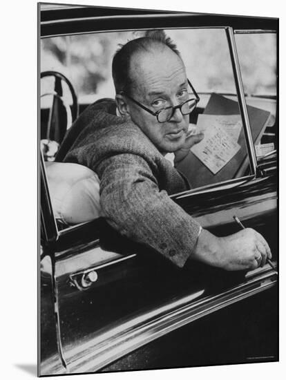 Author Vladimir Nabokov Writing in His Car. He Likes to Work in the Car, Writing on Index Cards-Carl Mydans-Mounted Premium Photographic Print