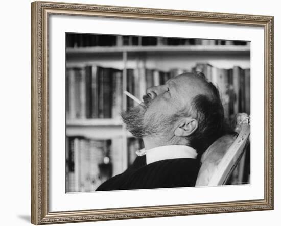 Author William Golding Relaxing in Chair While Cigarette, at Home in Village of Bower Chalk-Paul Schutzer-Framed Premium Photographic Print