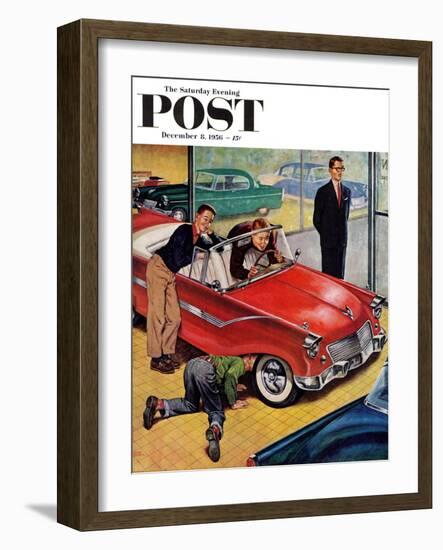 "Automobile Showroom" Saturday Evening Post Cover, December 8, 1956-Amos Sewell-Framed Giclee Print