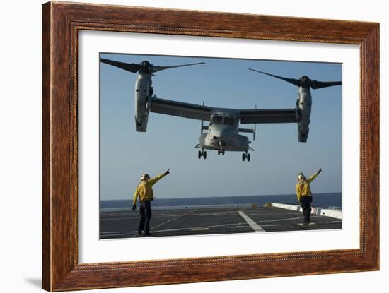 Aviation Boatswain's Mates Direct an MV-22 Osprey as it Launches from the Flight Deck-null-Framed Photographic Print