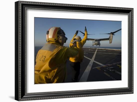 Aviation Boatswain's Mates Direct an MV-22 Osprey on the Flight Deck-null-Framed Photographic Print