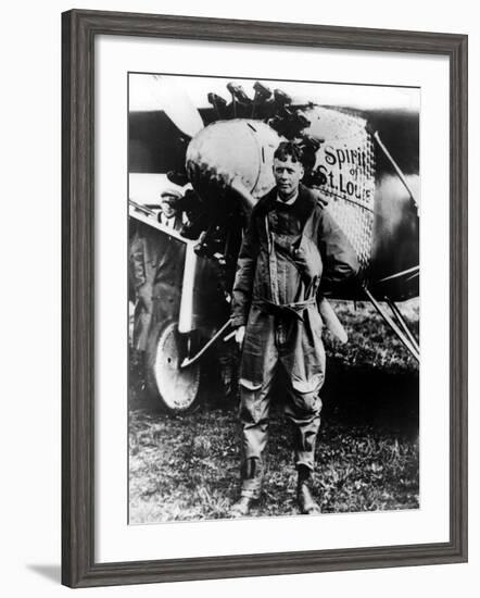 Aviator Charles Lindbergh Posing in Front of His Plane "The Spirit of St. Louis."-null-Framed Premium Photographic Print