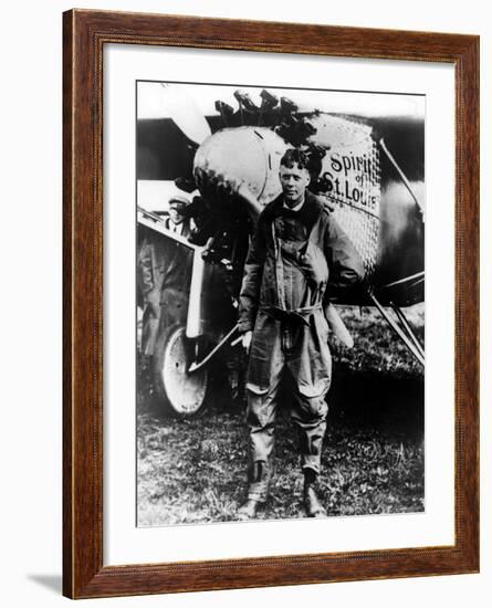 Aviator Charles Lindbergh Posing in Front of His Plane "The Spirit of St. Louis."-null-Framed Premium Photographic Print