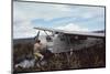 Aviator Roland Angel Repaints His Father's Flamingo Monoplane, Auyantepui, Venezuela, 1965-Carl Mydans-Mounted Photographic Print