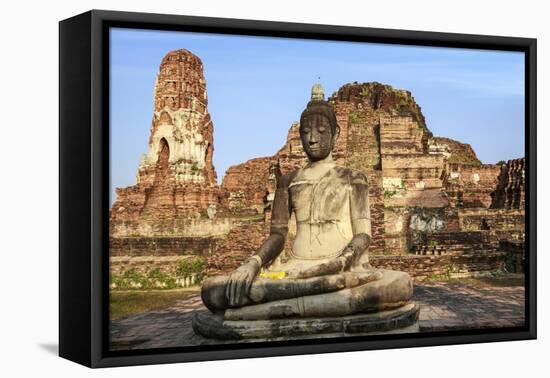 Ayutthaya, Thailand. Large Buddha at Wat Phra Mahathat, Ayutthaya Historical Park, near Bangkok-Miva Stock-Framed Premier Image Canvas