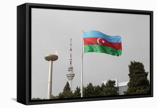 Azerbaijan, Baku. an Azerbaijan Flag Waves Near a Memorial Flame and the Baku Tv Tower-Alida Latham-Framed Premier Image Canvas