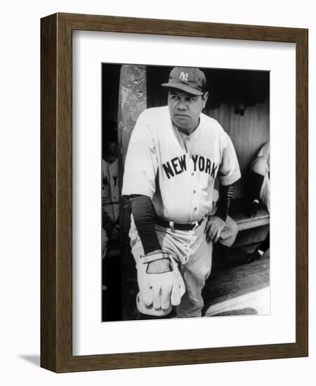 Babe Ruth in the New York Yankees Dugout at League Park in Clevelenad, Ohio, 1934-null-Framed Premium Giclee Print