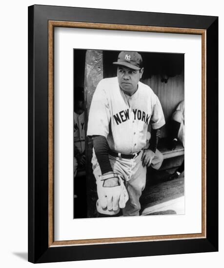 Babe Ruth in the New York Yankees Dugout at League Park in Clevelenad, Ohio, 1934-null-Framed Premium Giclee Print
