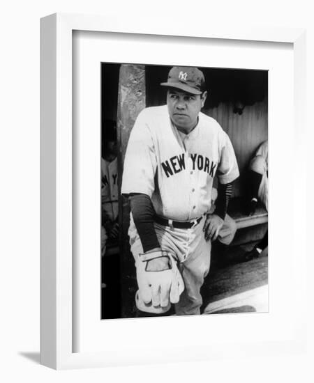 Babe Ruth in the New York Yankees Dugout at League Park in Clevelenad, Ohio, 1934-null-Framed Premium Giclee Print