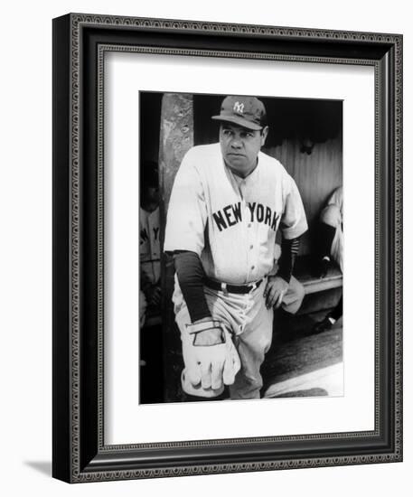 Babe Ruth in the New York Yankees Dugout at League Park in Clevelenad, Ohio, 1934-null-Framed Premium Giclee Print