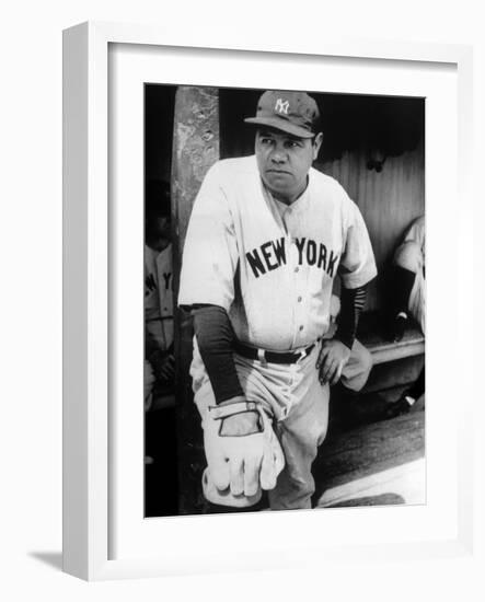 Babe Ruth in the New York Yankees Dugout at League Park in Clevelenad, Ohio, 1934-null-Framed Art Print