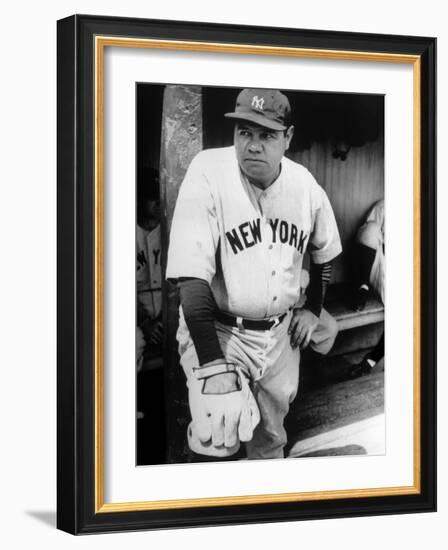 Babe Ruth in the New York Yankees Dugout at League Park in Clevelenad, Ohio, 1934-null-Framed Art Print