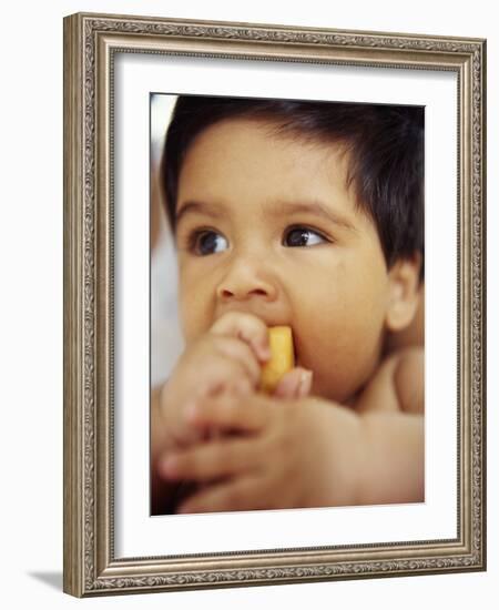 Baby Boy Eating-Ian Boddy-Framed Photographic Print