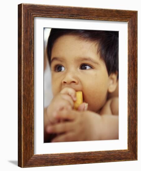 Baby Boy Eating-Ian Boddy-Framed Photographic Print