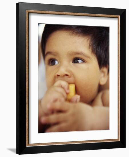 Baby Boy Eating-Ian Boddy-Framed Photographic Print