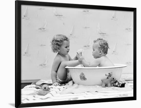 Baby Boy Sittings In Wash Tub Washing Feet Of Girl Sitting Outside Of Tub Framed Photographic Print By H Armstrong Roberts Art Com