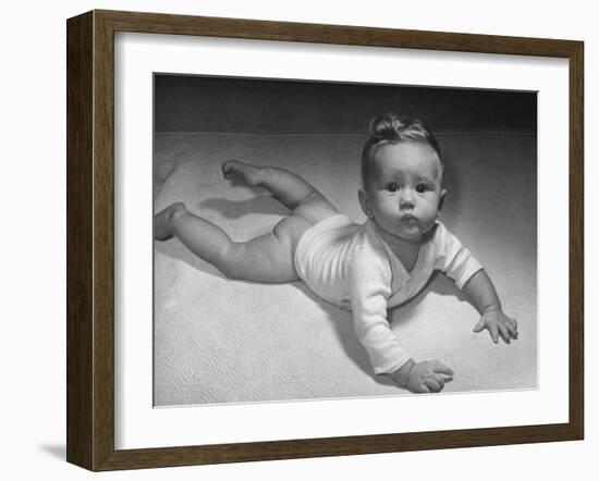 Baby Carol on Her Belly, Wearing Only a Shirt During the War Shortages-Nina Leen-Framed Photographic Print