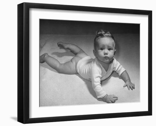 Baby Carol on Her Belly, Wearing Only a Shirt During the War Shortages-Nina Leen-Framed Photographic Print