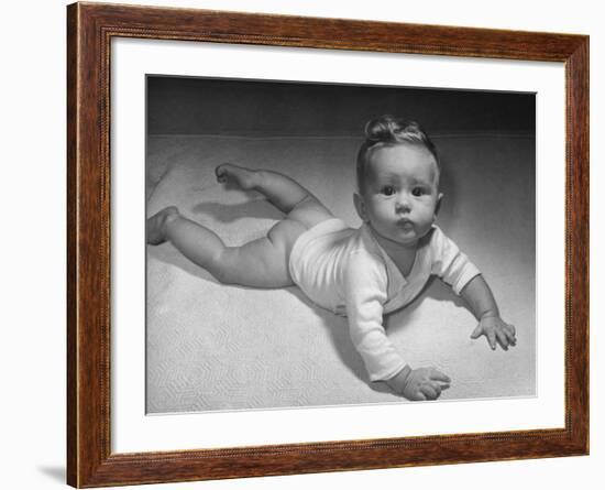 Baby Carol on Her Belly, Wearing Only a Shirt During the War Shortages-Nina Leen-Framed Photographic Print