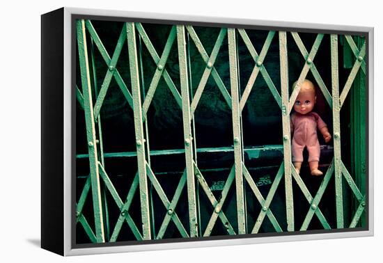 Baby Doll Through Security Fence NYC-null-Framed Stretched Canvas