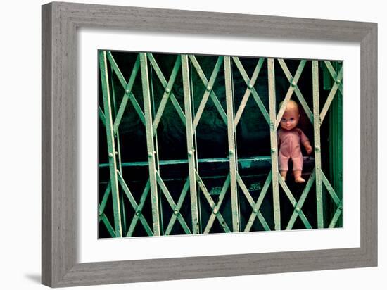 Baby Doll Through Security Fence NYC-null-Framed Photo