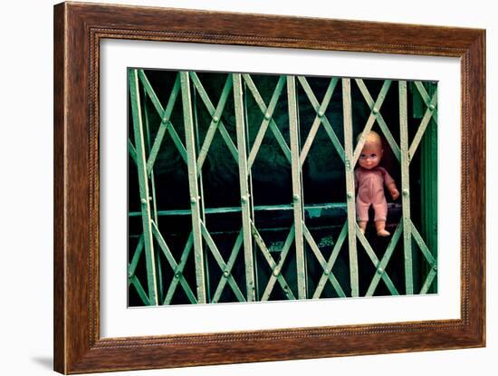 Baby Doll Through Security Fence NYC-null-Framed Photo