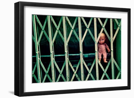 Baby Doll Through Security Fence NYC-null-Framed Photo