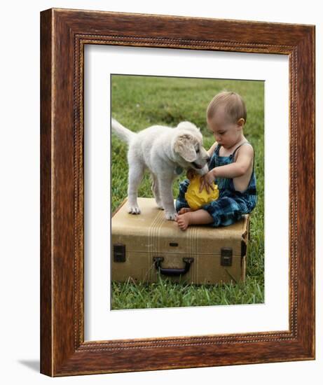 Baby Girl Playing with Puppy-Chris Lowe-Framed Photographic Print